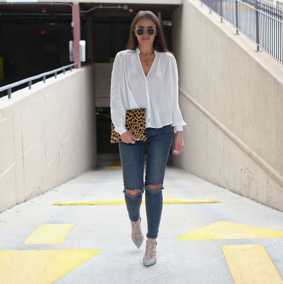 Blogger Sarah Lindner of The House of Sequins wearing Payless Midnight Caged Heels and free people distressed jeans