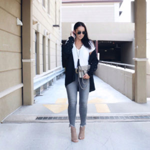Blogger Sarah Lindner of The House of Sequins wearing Faux Pearl Detail Cardigan DREAMERS BY DEBUT, vince camuto block heels and frame grey frayed jeans for fall