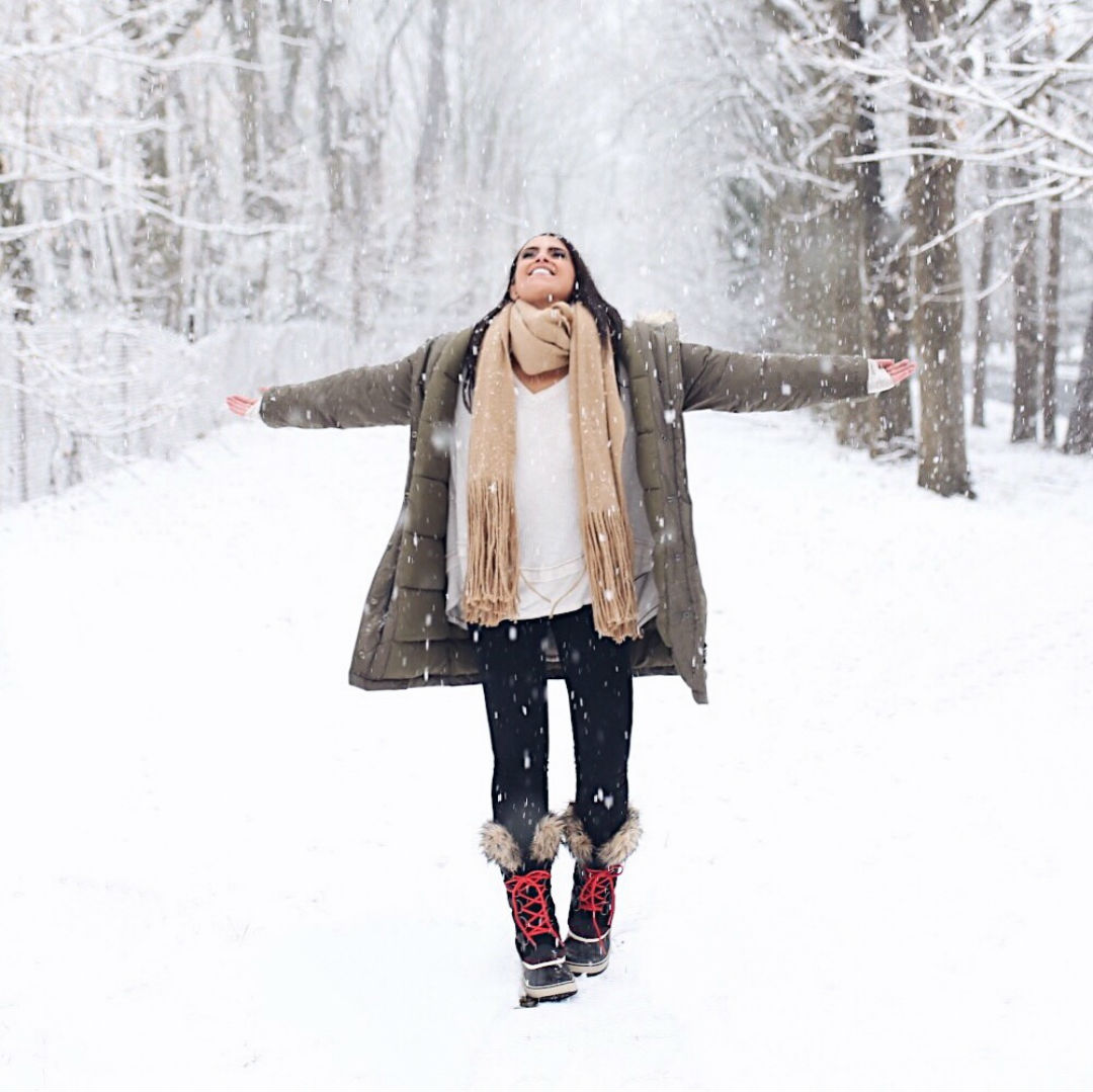 Blogger Sarah Lindner of the house of sequins wearing the best boots for the snow. Sorel Joan of Arctic snow boots and topshop Monty Faux Fur Trim Hooded Long Parka