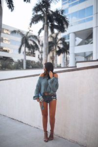 Blogger Sarah Lindner of The House of Sequins Wearing Free People Pandora Boatneck Sweater and Amuse Society on the run shorts