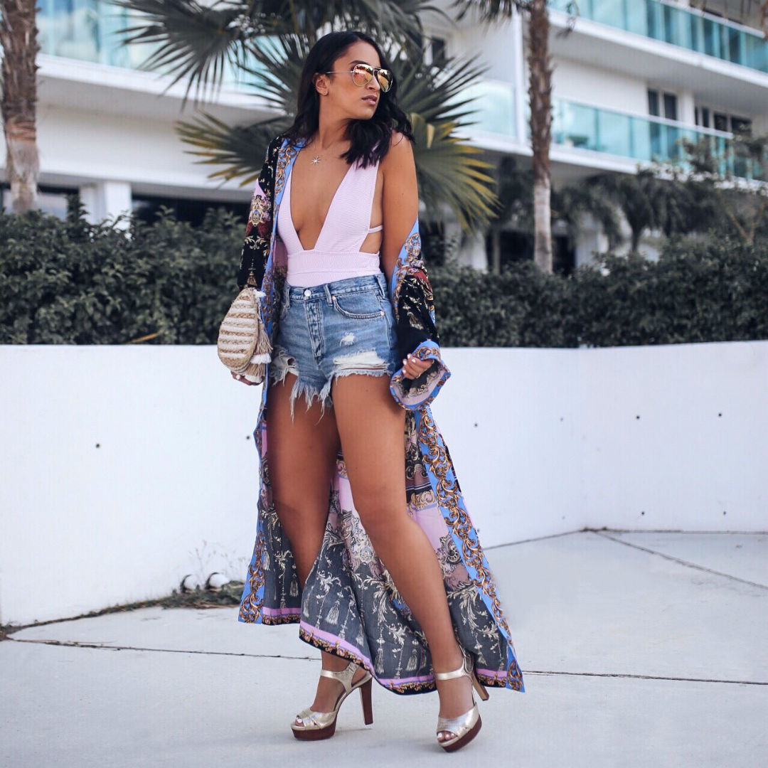 Blogger Sarah Lindner of The House of sequins wearing Free people let's dance kimono jacket