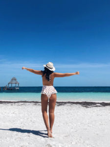 Blogger Sarah Lindner of The House of Sequins wearing Pompom One-Piece Swimsuit from Montce and Rip Curl Oasis Caridgan. Best one piece swimsuit to wear on vacation