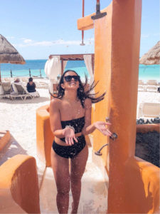 Blogger Sarah Lindner of The House of Sequins Wearing Volcom Simply Seamless One-Piece Swimsuit in black. What to wear to cancun mexico