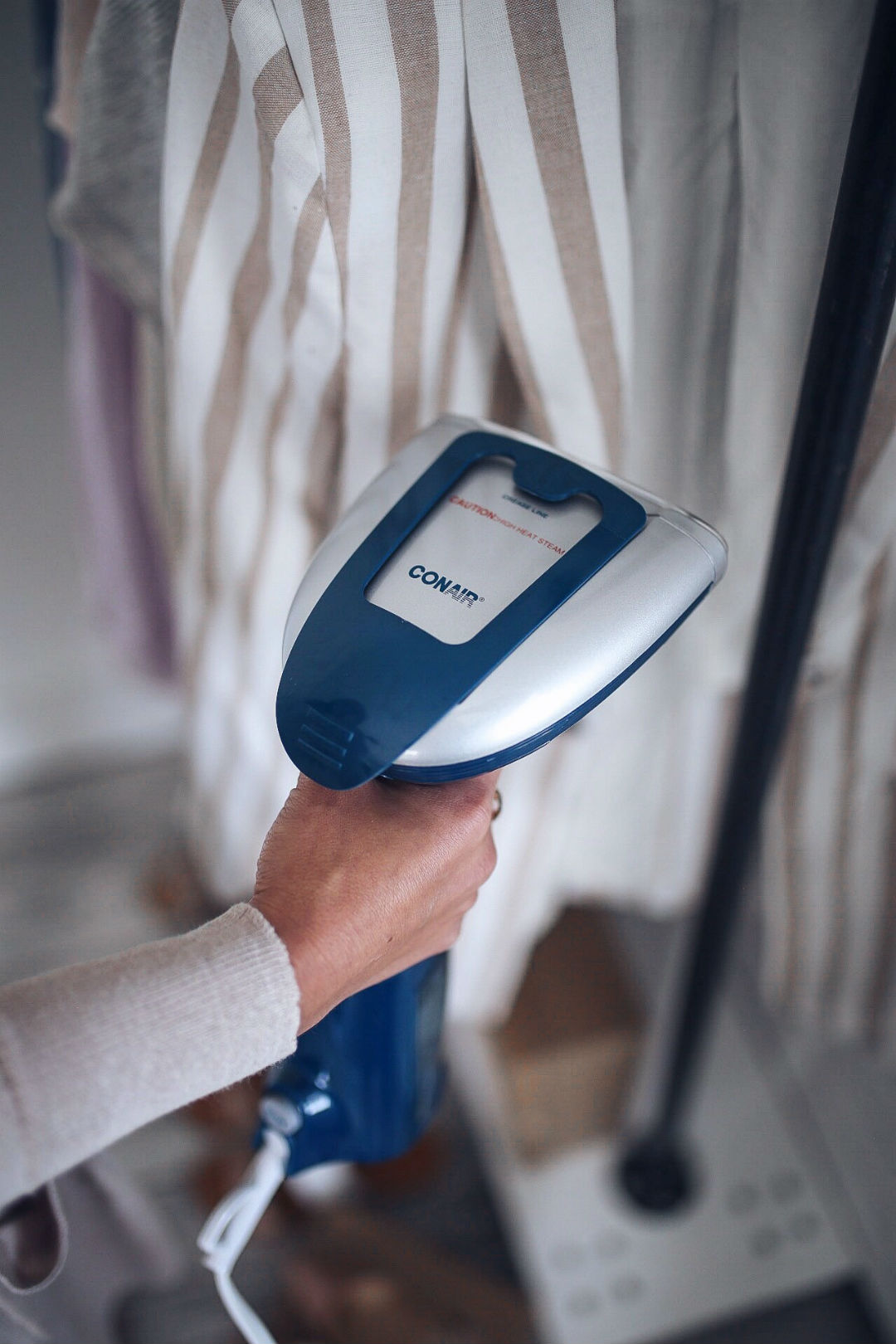 Blogger Sarah Lindner of The House of Sequins review on Conair Turbo ExtremeSteme Handheld Steamer. Best steamer for clothing and the home