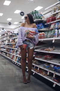 Blogger Sarah Lindner of The House of Sequins wearing free people boatneck chunky knit sweater and one teaspoon bandit shorts. What To Wear When Target Shopping