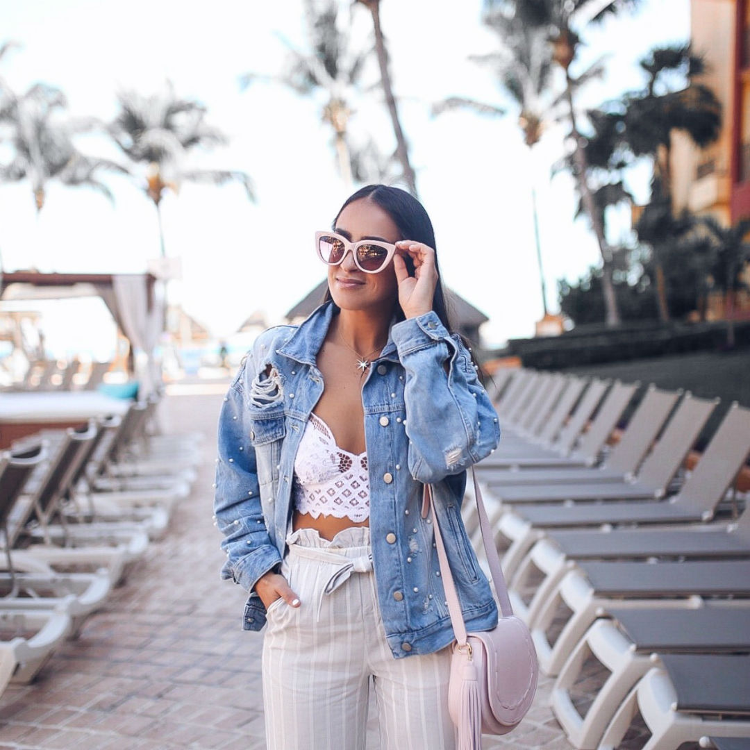 Blogger Sarah Lindner of The House of Sequins wearing free people sunday funday tucker denim jacket, Adella Longline Bralette by free people, Endless Rose Ruffle Pants in Heather Grey