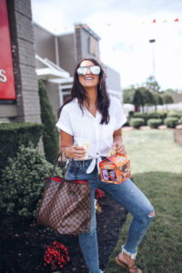 Blogger Sarah Lindner of The House of Sequins wearing Bella Dahl Eyelet-Stripe Shirt, express distressed skinny jeans, tory burch miller sandals, Louis Vuitton neverfull gm tote bag