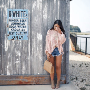 blogger Sarah Lindner of The House of Sequins wearing Free People Striped Island Girl Hacci Top and TopShop Kiri Fray Hem shorts