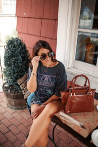 Blogger Sarah Lindner of The House of Sequins wearing Vintage Aerosmith Boyfriend Tee and Topshop shorts