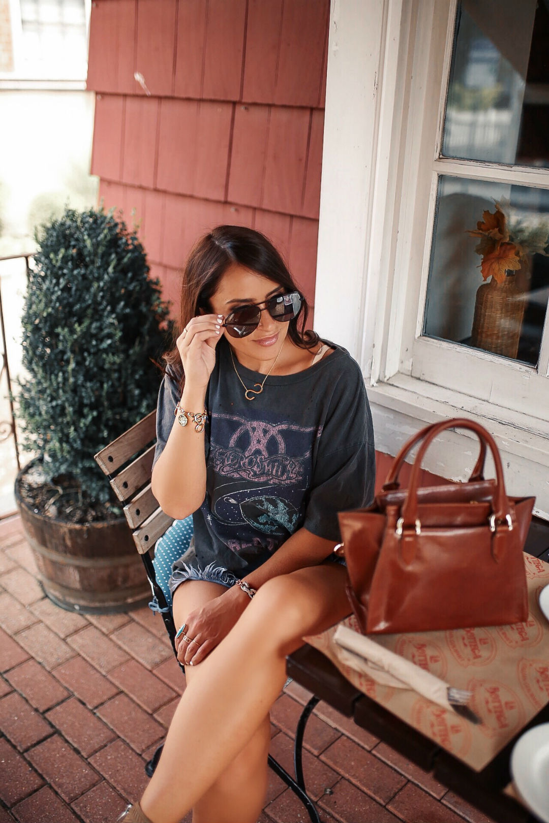 Blogger Sarah Lindner of The House of Sequins wearing Vintage Aerosmith Boyfriend Tee and Topshop shorts 