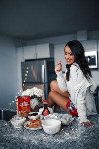 Blogger Sarah Lindner of The House of Sequins wearing flannel shorts from Abercrombie & Fitch and hooded cardigan. Best pajama set for the holidays under $50
