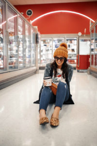 Blogger Sarah Lindner of The House of Sequins wearing Big Apple Tee by Free People, 1822 Decon Distressed Skinny Jeans, Camo Cardigan Cover-Up from Express, Steve Madden makes their Feather L Genuine Calf Hair Loafer Flat, and tory burch miller clutch. What to wear while target shopping.