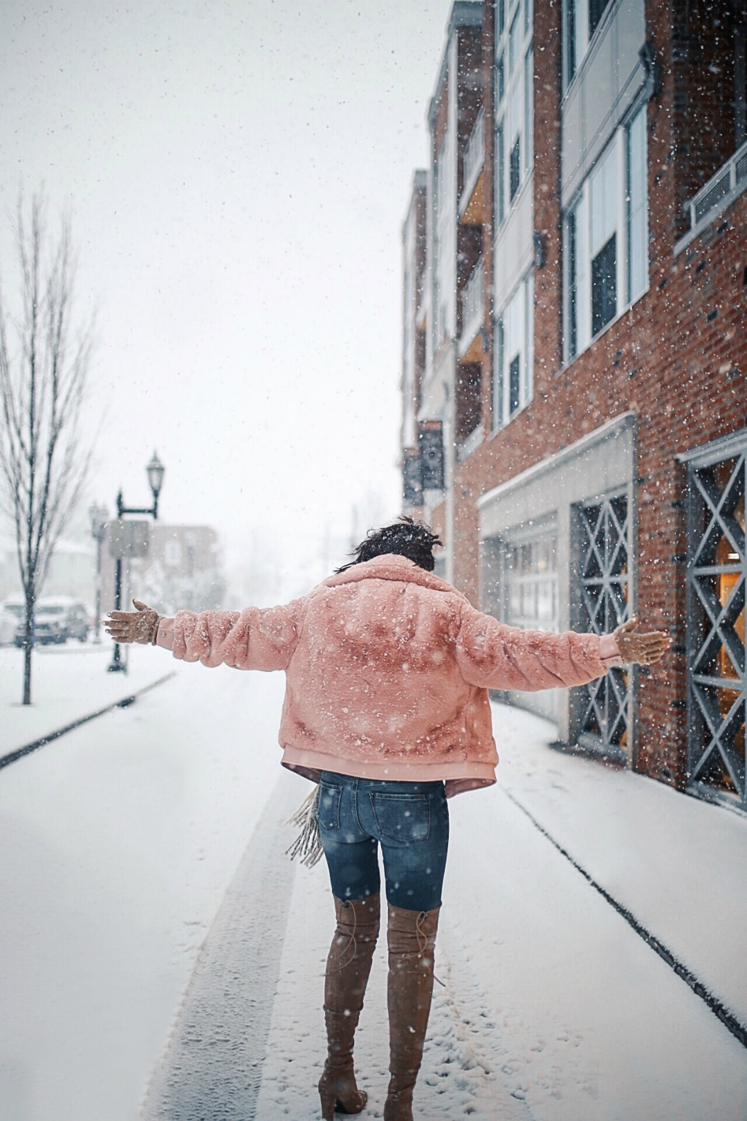 Blogger Sarah Lindner of The House of Sequins wearing BlankNYC Faux Fur Jacket in blush, Stuart Weitzman and they are the Tie-model Over The Knee Stretch boots, Abercrombie & Fitch Cozy Scarf. What to wear on a snow day