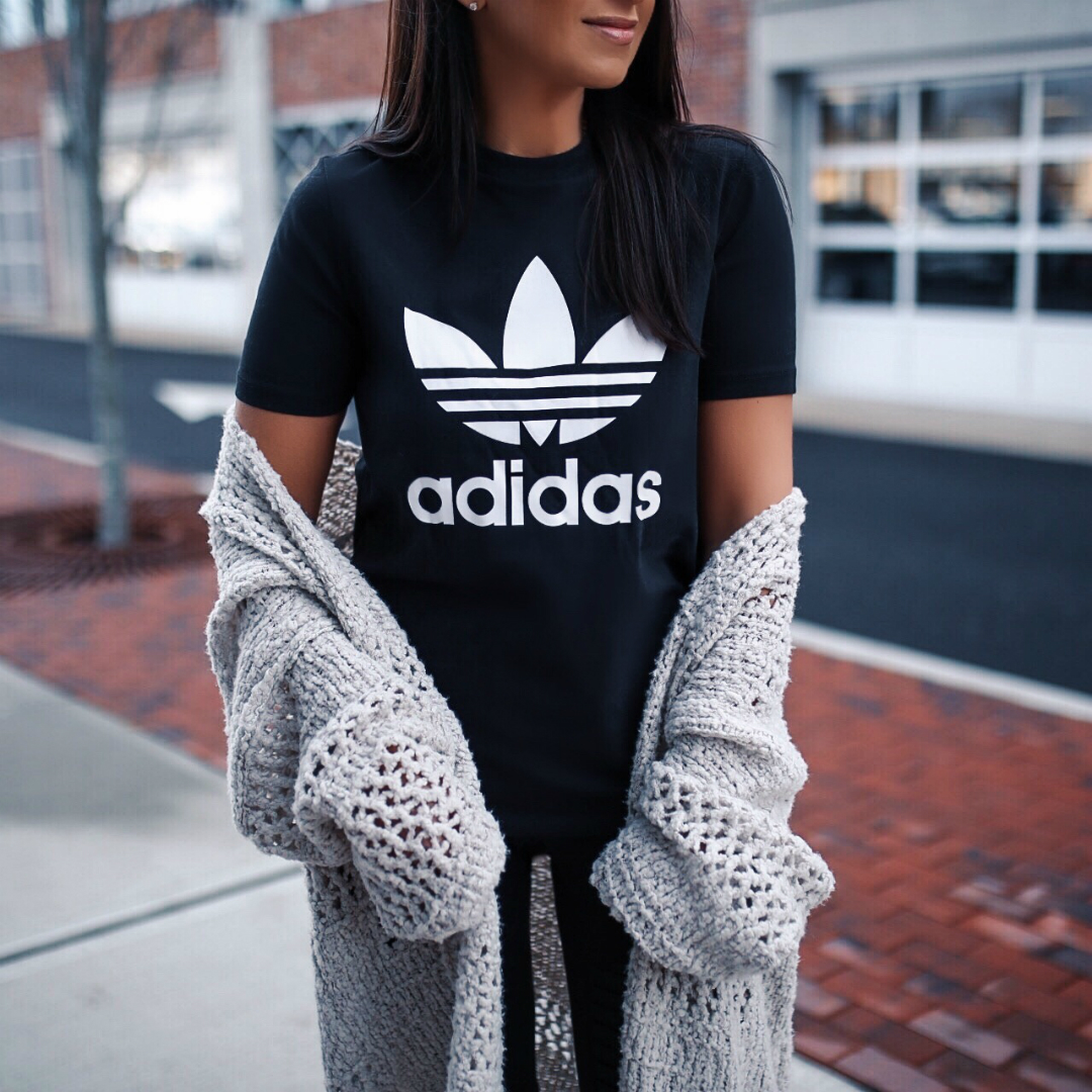 Blogger Sarah Lindner of The House of Sequins wearing Adidas Ultraboost 4.0 Running Shoes from Finish Line. Best running sneakers for the New Year.