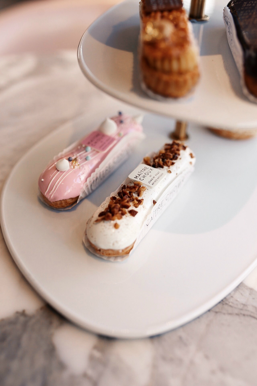 Blogger Sarah Lindner of The House of Sequins Afternoon tea at MAITRE CHOUX in London. Where to go for afternoon tea in London
