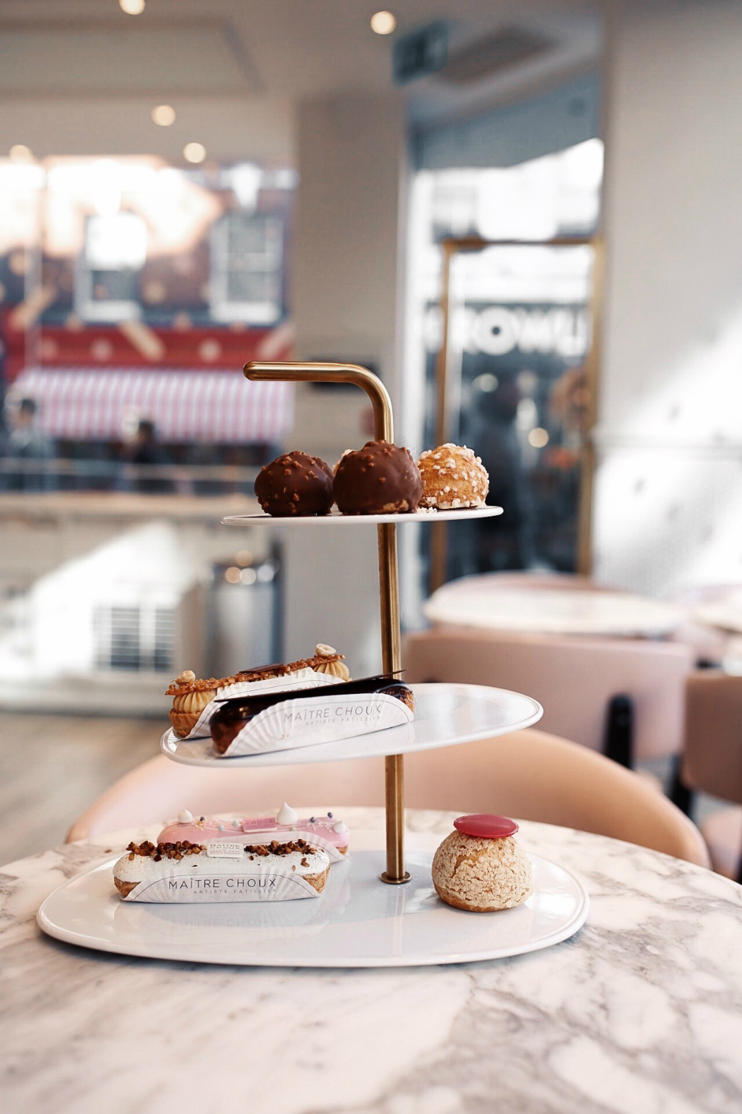 Blogger Sarah Lindner of The House of Sequins Afternoon tea at MAITRE CHOUX in London. Where to go for afternoon tea in London