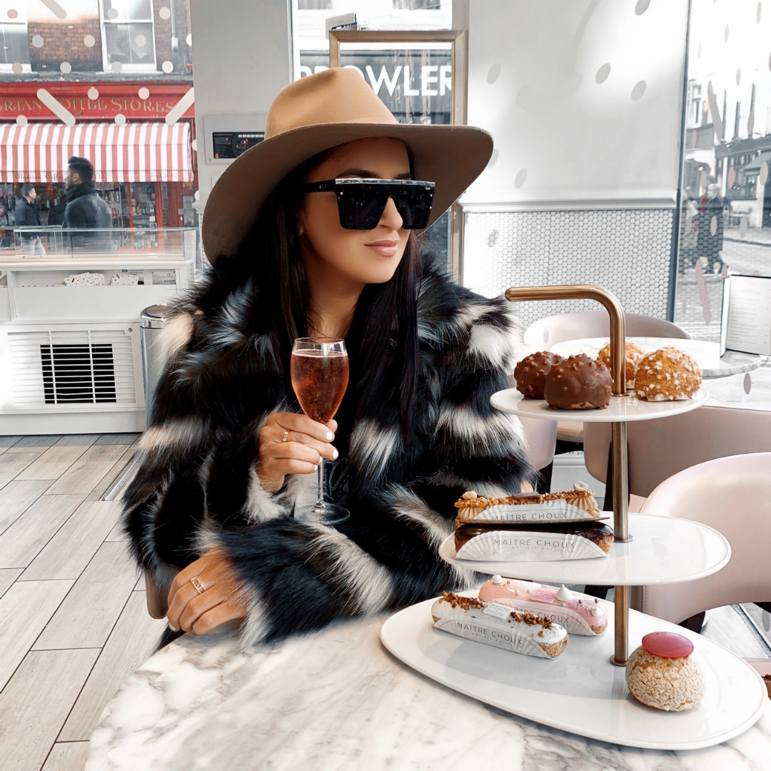 blogger sarah Lindner of the house of sequins wearing Show Me Your Mumu Raymond Jacket, Gucci GG Marmont velvet medium shoulder bag, Quay Hindsight with Gold Bar Sunglasses, Free People Just Float On Flare Jeans