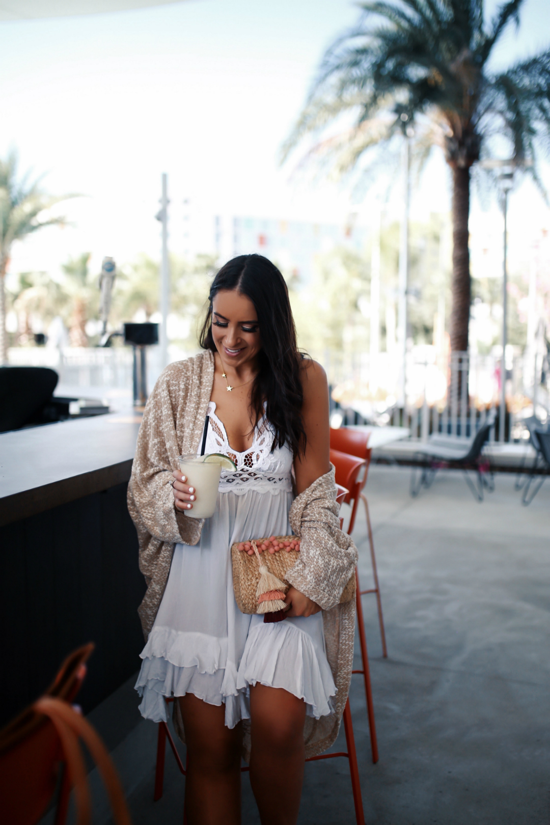 Blogger Sarah Lindner of The House of Sequins wearing Free People Adella Frilled Chemise Dress