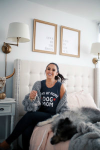 Blogger Sarah Lindner of The House of Sequins wearing chaser stay at home dog mom tee shirt
