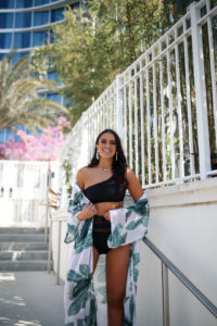 Blogger Sarah Lindner of The House of Sequins wearing 2 piece mesh black bikini from target, chiffon palm tree cover up. Must have black bikini from Target under $50