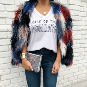 Blogger Sarah Lindner of The House of Sequins wearing Retro Brand Case of the Mondays tee, white heart sunglasses, Shaggy Faux Fur Jacket by Astr The Label, and free people Float On Flare Jeans