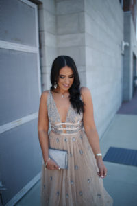 Blogger, Sarah Lindner of The House Of Sequins wearing a sequin wedding guest dress