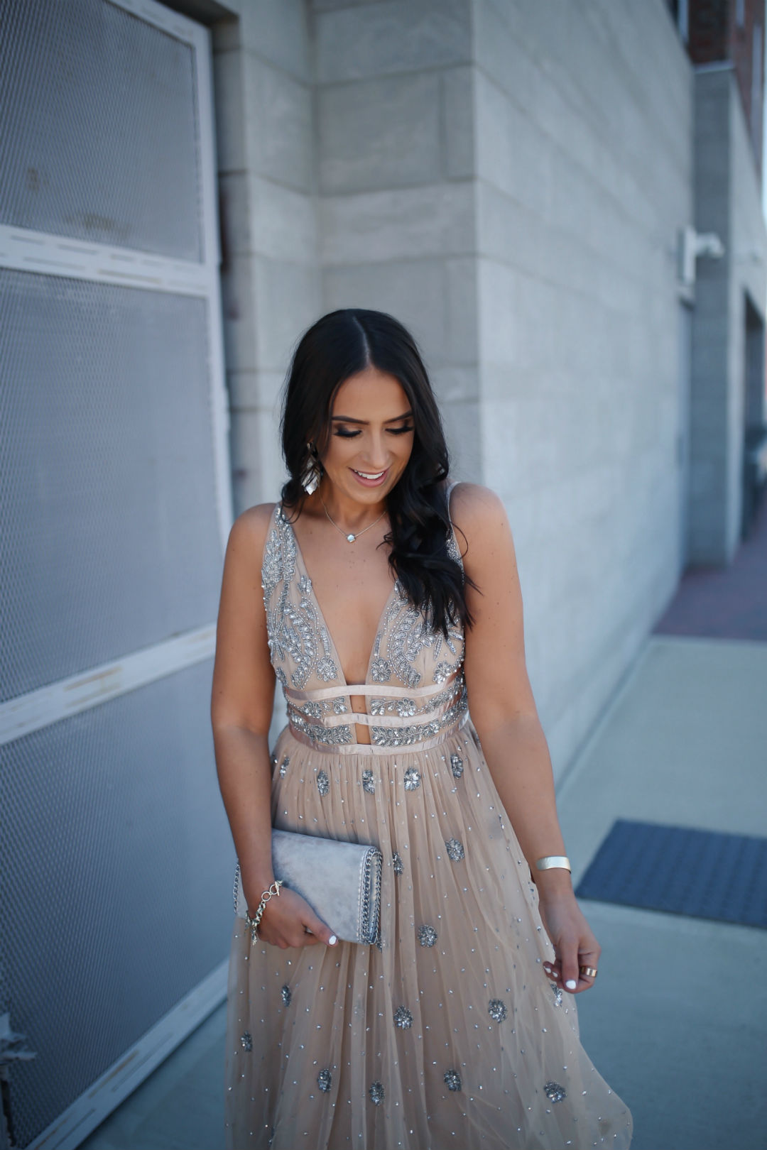 Blogger, Sarah Lindner of The House Of Sequins wearing a sequin wedding guest dress