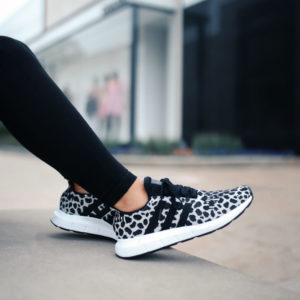 Blogger, Sarah Lindner of The House Of Sequins wearing Leopard Adidas sneakers