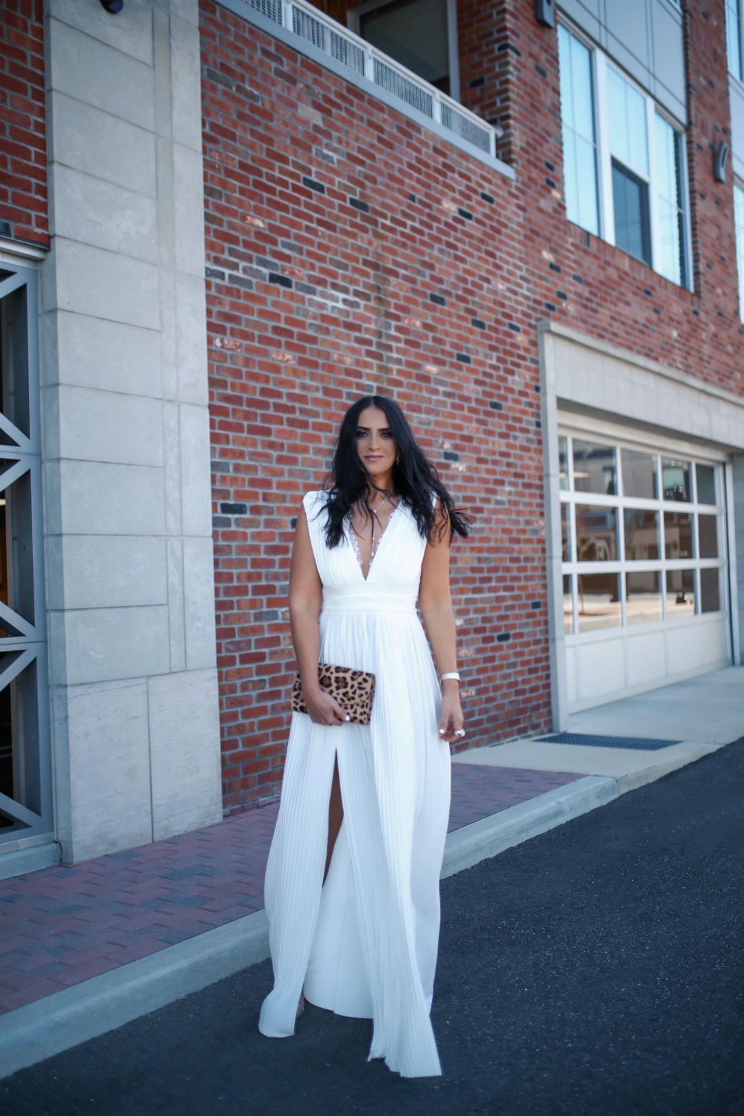 Sarah Lindner, of The House Of Sequins wearing neutral wedding guest dresses