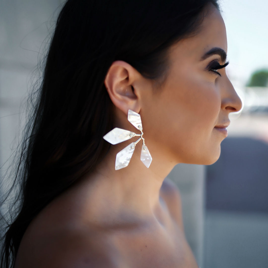 Blogger, Sarah Lindner of The House Of Sequins wearing Kendra Scott earrings