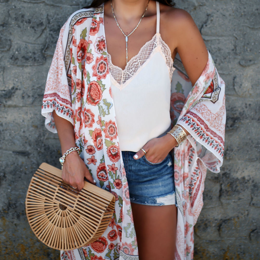Blogger, Sarah Lindner of The House Of Sequins wearing an amazon kimono with a lace cami and denim shorts