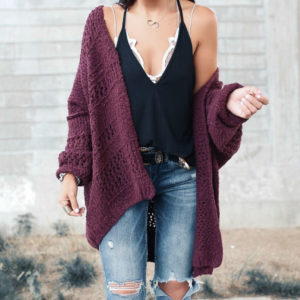 Blogger, Sarah Lindner of The House Of Sequins wearing a free people slinky cami, with ripped jeans and a cardigan