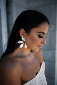 Blogger, Sarah Lindner of The House Of Sequins wearing Kendra Scott earrings