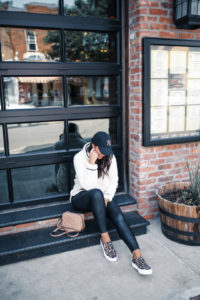 Blogger Sarah Lindner of The House of Sequins wearing Spanx Faux Leather leggings and Leopard steve madden gills slip on sneakers, Thread & Supply Milk Wubby Fleece