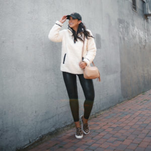 Blogger Sarah Lindner of The House of Sequins wearing Spanx Faux Leather leggings and Leopard steve madden gills slip on sneakers, Thread & Supply Milk Wubby Fleece