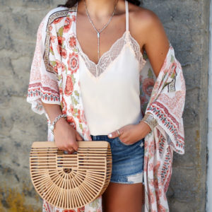 Blogger, Sarah Lindner of The House Of Sequins wearing an amazon kimono and camisole with denim shorts