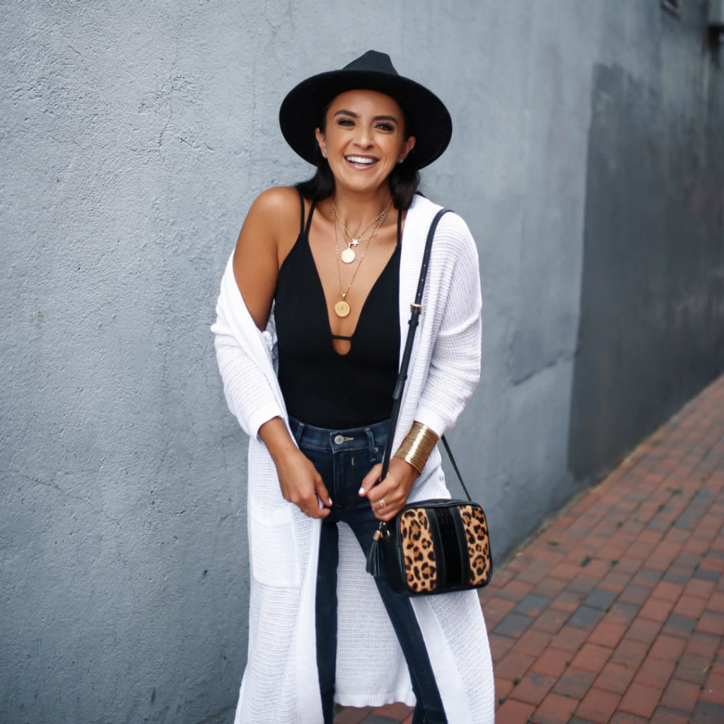 Blogger, Sarah Lindner of The House Of Sequins wearing Express jeans, camisole and cardigan