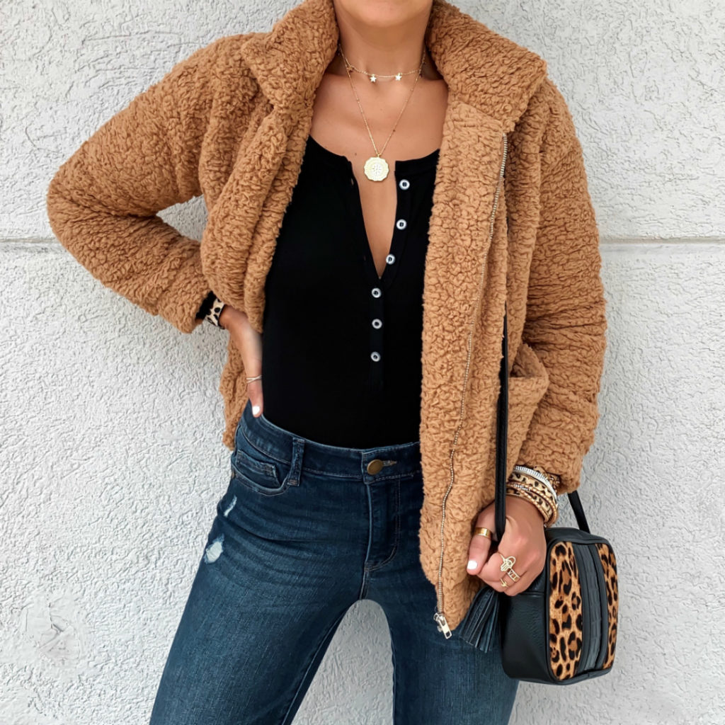 Blogger Sarah Lindner of The House of Sequins wearing amazon prime camel wubby fleece jacket and black bodysuit from amazon