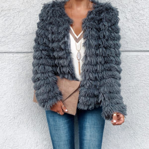 Blogger Sarah Lindner of The House of Sequins wearing amazon gray parka sweater
