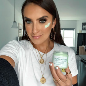 Blogger Sarah Lindner of The House of Sequins using Walmart Earth To Skin Skincare face cream