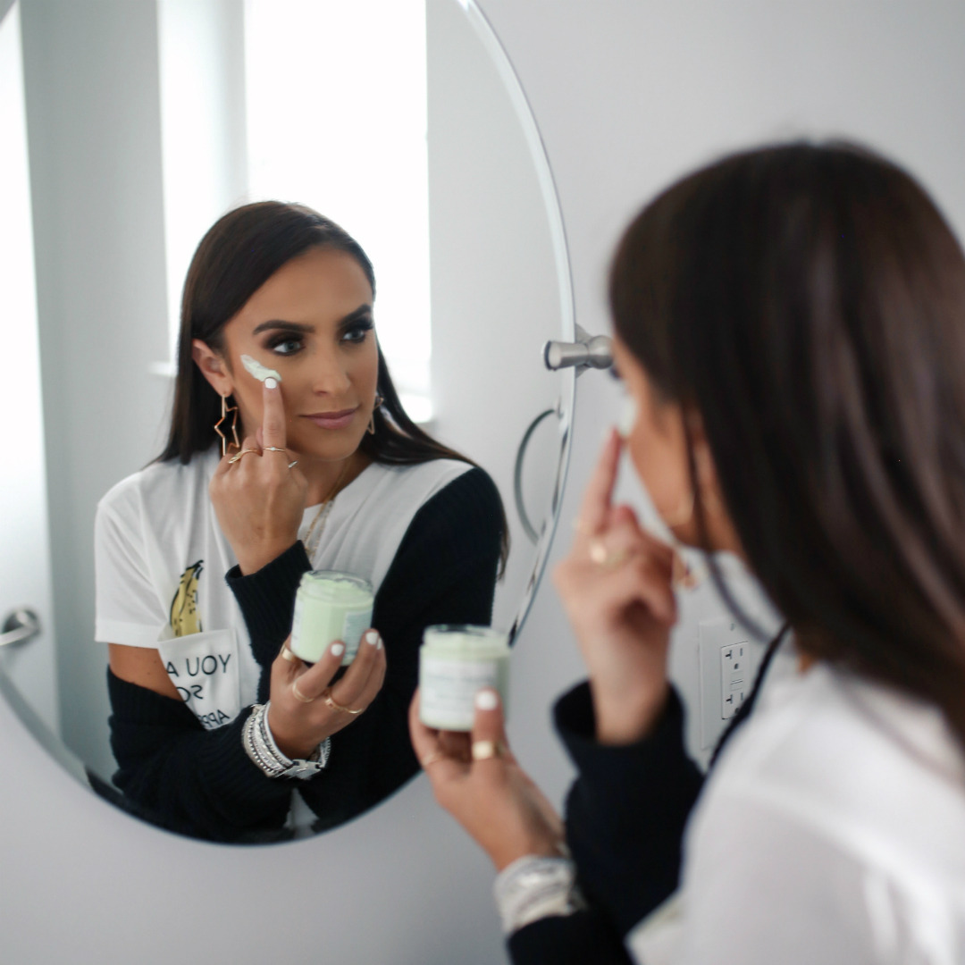 Blogger Sarah Lindner of The House of Sequins using Walmart Earth To Skin Skincare face cream