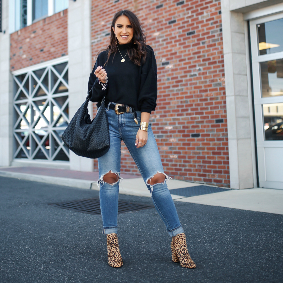 Blogger Sarah Lindner of The House of Sequins wearing Free People So Low So High cashmere sweater and Levi's 501 Skinny Jeans