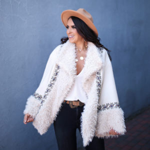 Sarah Lindner of The House of Sequins wearing Free People One Oslo Parka
