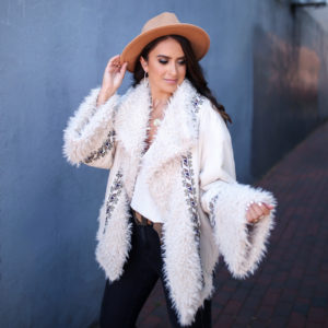 Sarah Lindner of The House of Sequins wearing Free People One Oslo Parka
