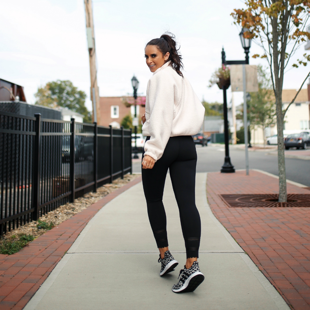 Blogger Sarah Lindner of House of Sequins wearing Free People Movement and Adidas Swift Leopard sneakers
