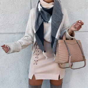 Blogger Sarah Lindner of House of Sequins wearing Amazon laceup faux suede skirt in blush