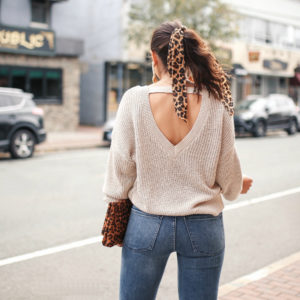 Blogger Sarah Lindner of House of Sequins wearing Express Cut-out sweater and Super High Waisted Denim