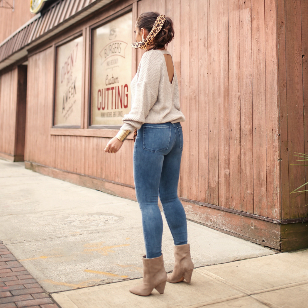 Blogger Sarah Lindner of House of Sequins wearing Express Cut-out sweater and Super High Waisted Denim