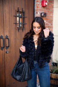 Blogger Sarah Lindner of The House of Sequins wearing faux fur cardigan from Amazon.