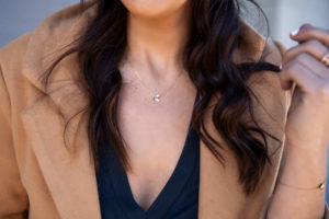 Blogger Sarah Lindner of the House of Sequins wearing Tous Alecia bracelet and Superpower necklace